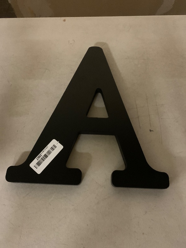 Photo 1 of AOCEAN 12 inch Black Wood Letters Unfinished Wood Letters for Halloween Decorative Standing Letters Slices Sign Board Decoration for Craft Home Party Projects (A)