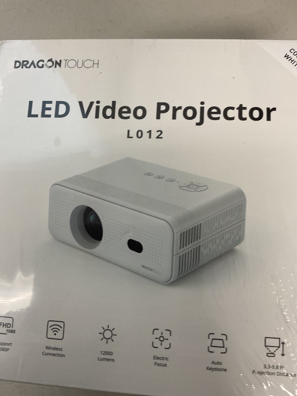 Photo 1 of Dragon Touch Mini Projector with WiFi and Bluetooth, 1080P Portable Movie Projector with Stand for Home/Outdoor, 12000L Electric Focus Projector Compatible with Phone/Laptop/TV Stick
