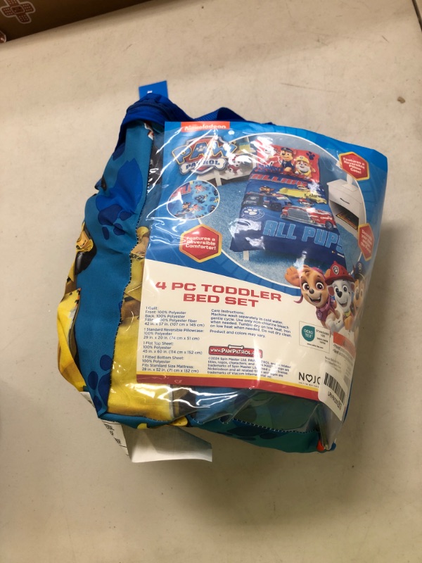 Photo 1 of Paw Patrol Calling All Pups 4 Piece Toddler Bedding Set – Includes Comforter, Sheet Set – Fitted + Top Sheet + Reversible Pillowcase for Boys Bed, Blue