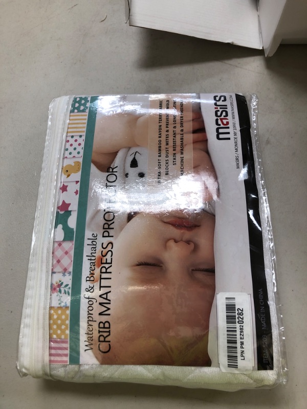 Photo 1 of Masirs Crib Mattress Protector Cover - Comfortable, Breathable and Waterproof Material. Keep The Crib Mattress Clean and Protected and Give Your Baby a Cozy Restful Sleep. Machine and Dryer Friendly.