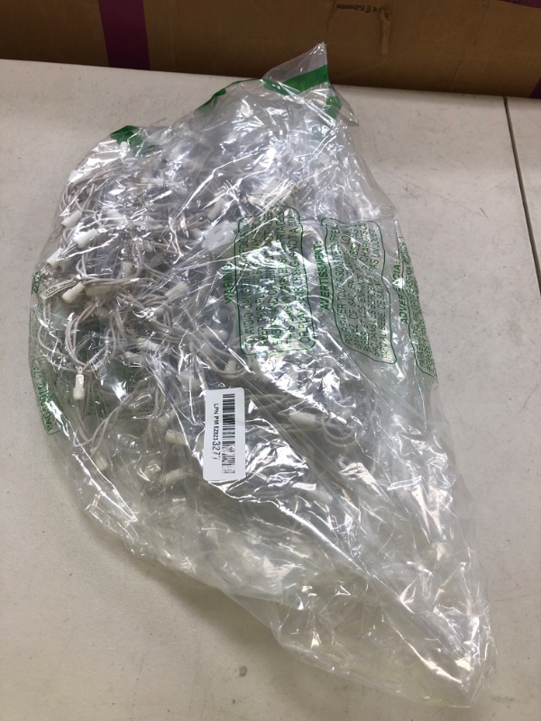 Photo 1 of Christmas Lights 100 Count Mini Clear Lights 32ft White Wire Christmas Tree String Lights Set for Outdoor Indoor Christmas Decorations Wedding Decorations Valentines Day Decor,UL Certified (32feet)