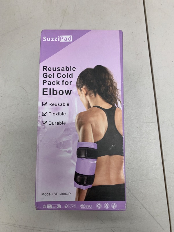 Photo 1 of SuzziPad Elbow Ice Pack Wrap – Wearable Cold Compression Sleeve for Elbow & Forearm, Reusable Ice Pack for Tennis & Golf Recovery, Purple