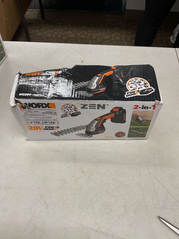 Photo 1 of WORX WG801 20V 2 in 1 Cordless Hedge Trimmer, 4" Grass Shear & 8" Shrub Trimmer with 2 Blades, Battery & Charger Included