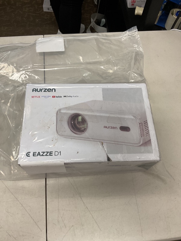 Photo 1 of Aurzen EAZZE D1 Smart Projector with WiFi and Bluetooth, Netflix-Officially-Licensed, Auto Focus & Keystone, DoIby Audio, Zoom, Native 1080P Movie, Portable Outdoor Mini Projector, White