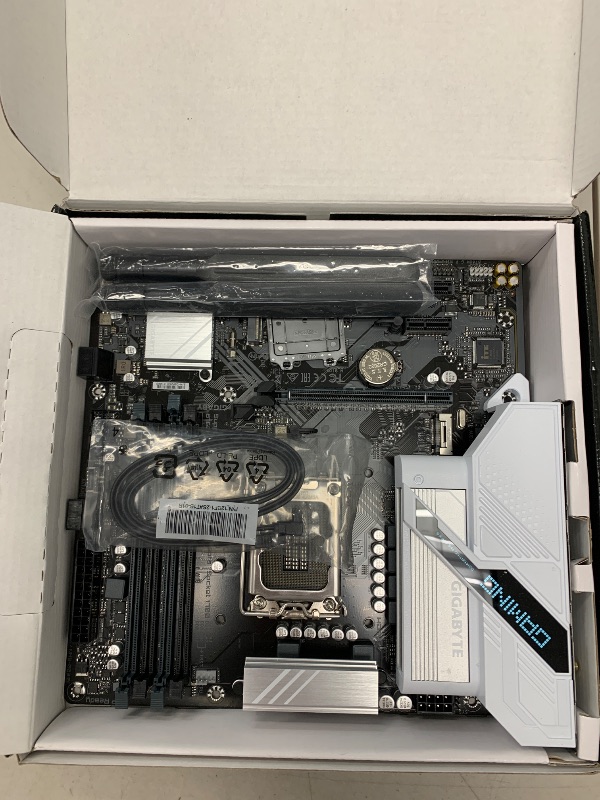 Photo 1 of GIGABYTE B760M Gaming Plus WiFi DDR4 LGA 1700 Intel B760 M-ATX Motherboard with DDR4, 2* M.2, PCIe 4.0, Front USB 3.2 Gen 1 Type-C, WiFi 6 GbE LAN, Q-Flash Plus, PCIe EZ-Latch
