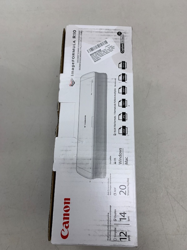 Photo 1 of Canon imageFORMULA R10 - Portable Document Scanner, USB Powered, Duplex Scanning, Document Feeder, Easy Setup, Convenient, Perfect for Mobile Users