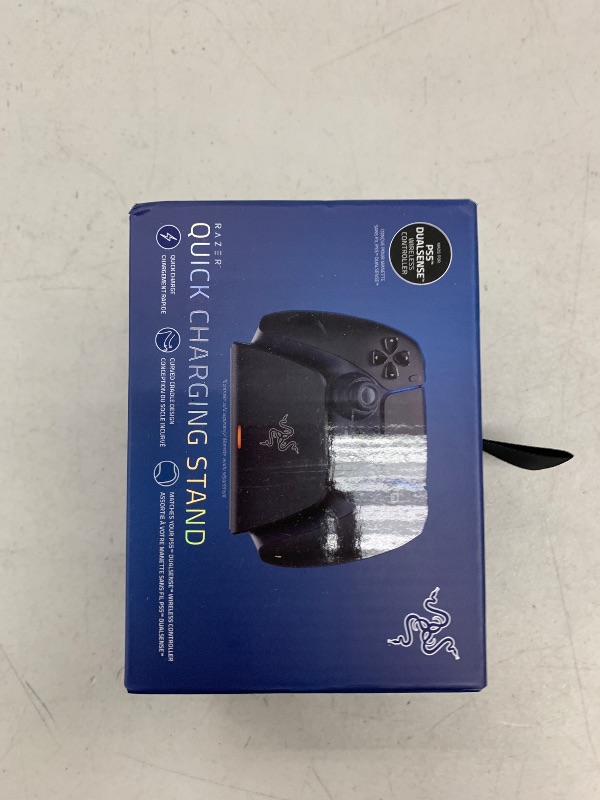Photo 1 of Razer Quick Charging Stand for PlayStation 5: - Curved Cradle Design - Matches PS5 DualSense Wireless Controller - One-Handed Navigation - USB Powered - Black (Controller Sold Separately)