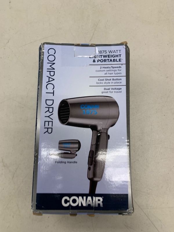Photo 1 of Conair Travel Hair Dryer with Dual Voltage, 1875W Compact Hair Dryer with Folding Handle, Travel Blow Dryer