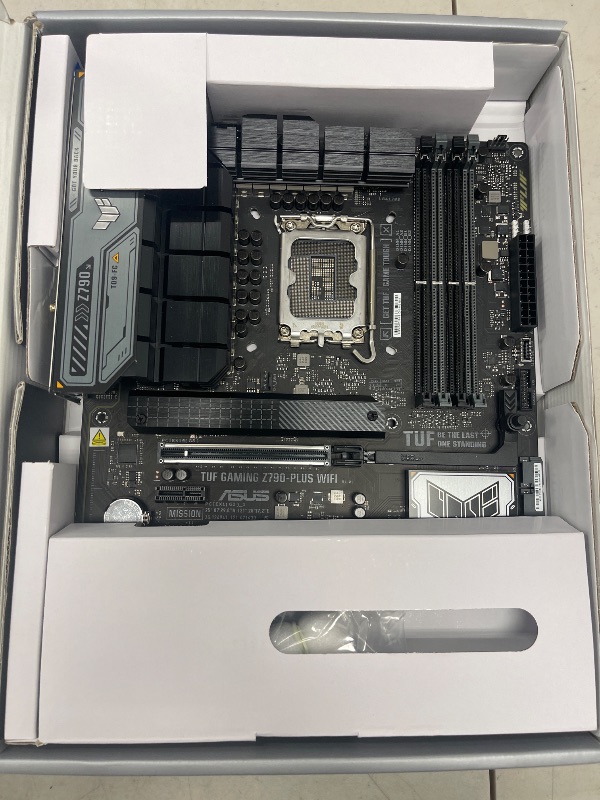 Photo 1 of FOR PARTS ONLY ASUS TUF GAMING Z790-PLUS WIFI 6E Motherboard Intel Z790 LGA 1700 ATX (PCIe 5.0, Four M.2, 16+1 DrMOS, DDR5, 2.5 Gb Ethernet, USB 3.1 Gen 2 x 2 Type C, Thunderbolt (USB4), Aura Sync, AEMP II)