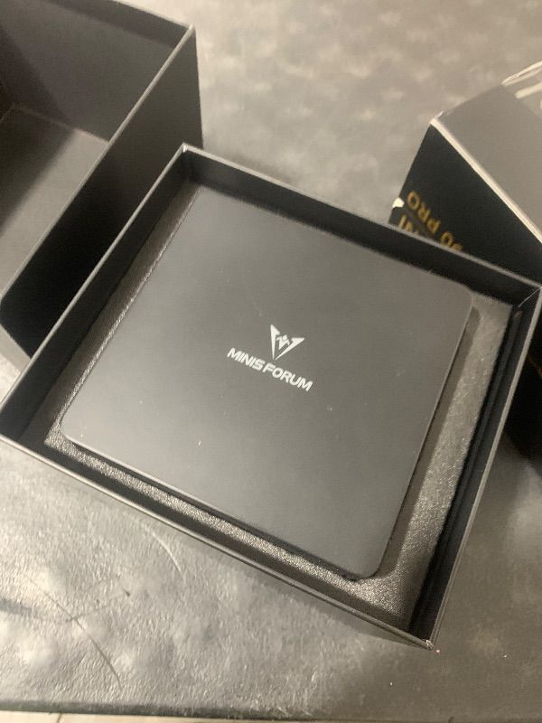 Photo 1 of MINISFORUM UM890 Pro Mini PC, AMD Ryzen 9 8945HS (up to 5.2GHz) Mini Computers, 32GB DDR5 5600MHz RAM&1TB PCIe 4.0 SSD, Mini Desktop Quad Display HDMI/DP1.4/USB-C, AMD Radeon 780M/Dual LAN 2.5G