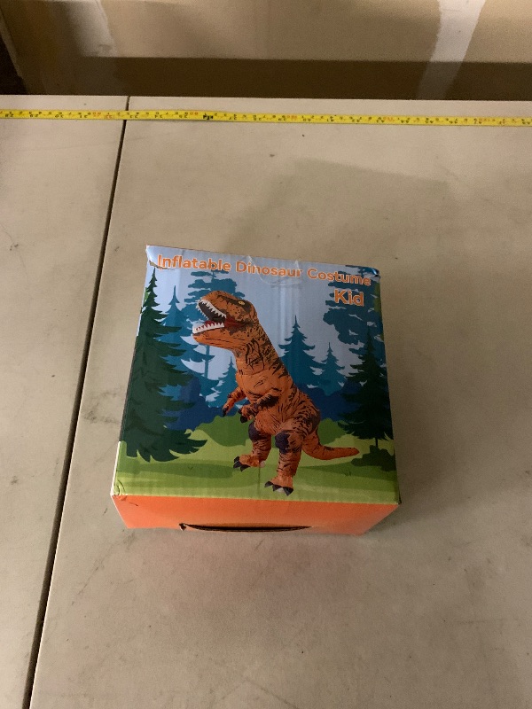 Photo 1 of Servllcell Inflatable Dinosaur Costume for Kids,Halloween Costumes T Rex Blow Up Costumes for Boys Girls,Funny Cosplay Party