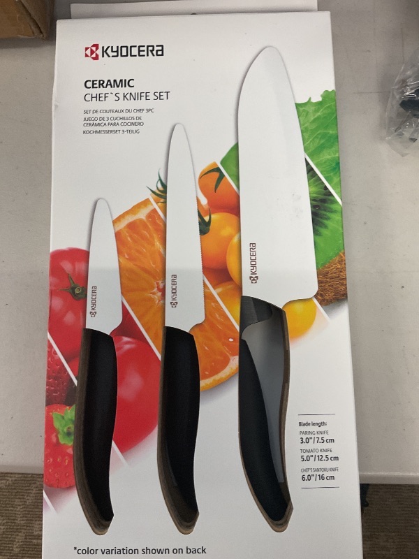 Photo 1 of Kyocera 3-Piece Ceramic Knife Set: Includes 6-inch Chef's Knife, 5-inch Micro Serrated Knife, and 3-inch Paring Knife - Red Handles with White Blades