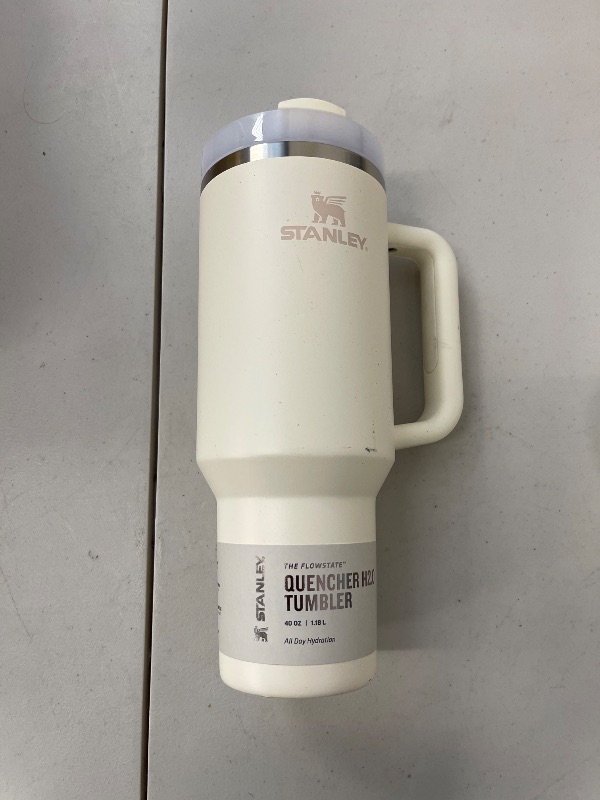 Photo 1 of STANLEY Quencher H2.0 Tumbler with Handle and Straw 40 oz | Flowstate 3-Position Lid | Cup Holder Compatible for Travel | Insulated Stainless Steel Cup | BPA-Free | Cream 2.0