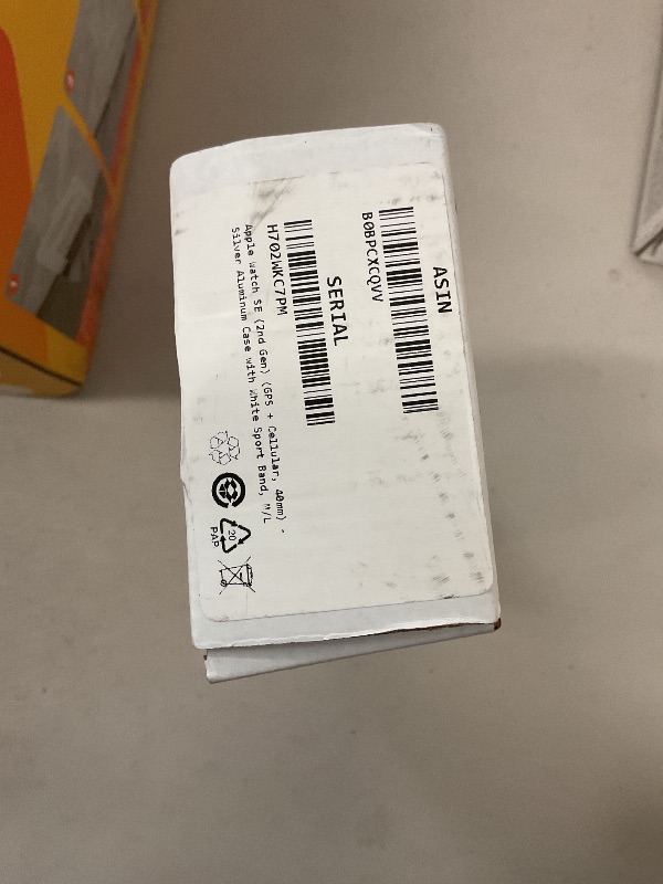 Photo 1 of Apple Watch SE (2nd Gen) (GPS + Cellular, 40mm) - Silver Aluminum Case with White Sport Band, M/L (Renewed)