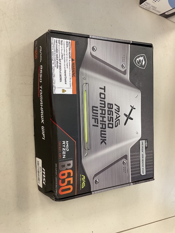 Photo 1 of MSI MAG B650 Tomahawk WiFi Gaming Motherboard (AMD Ryzen 9000/8000/7000 Series Processors, AM5, DDR5, PCIe 4.0, M.2, SATA 6Gb/s, USB 3.2 Gen 2, HDMI/DP, Wi-Fi 6E, Bluetooth 5.3, 2.5Gbps LAN, ATX)