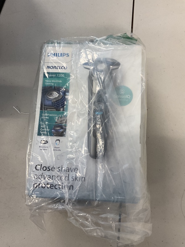 Photo 1 of Philips Series 7000 Shaver — Wet and Dry Electric Shaver, Beard, Stubble and Moustache Trimmer with SkinIQ Technology, Black