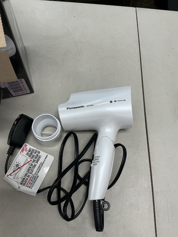 Photo 1 of Panasonic nanoe Compact Hair Dryer with Oscillating Quick Dry Nozzle for Healthier-Looking Hair, Folding Blow Dryer for Travel and Home, 3 Airflow Settings - EH-NA2C-W (White)