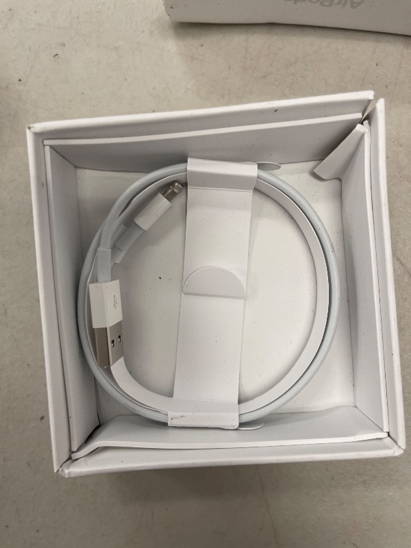Photo 1 of Apple AirPods Wireless Ear Buds, Bluetooth Headphones with Lightning Charging Case Included, Over 24 Hours of Battery Life, Effortless Setup for iPhone