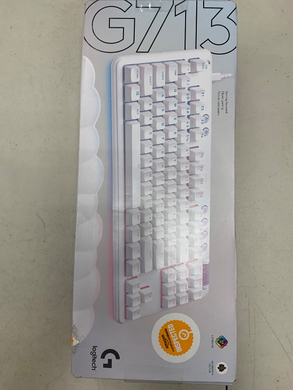 Photo 1 of Logitech G713 Wired Mechanical Gaming Keyboard with LIGHTSYNC RGB Lighting, Tactile Switches (GX Brown), and Keyboard Palm Rest, PC and Mac Compatible - White Mist
