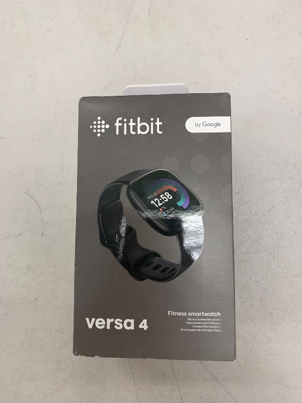 Photo 1 of Fitbit Versa 4 Fitness Smartwatch with Daily Readiness, GPS, 24/7 Heart Rate, 40+ Exercise Modes, Sleep Tracking and more, Black/Graphite, One Size (S & L Bands Included)