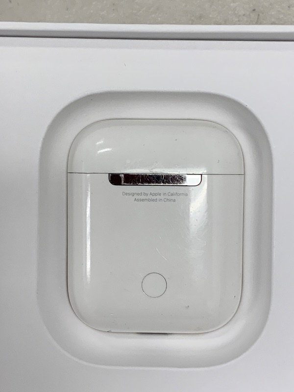 Photo 1 of Apple AirPods Wireless Ear Buds, Bluetooth Headphones with Lightning Charging Case Included, Over 24 Hours of Battery Life, Effortless Setup for iPhone
