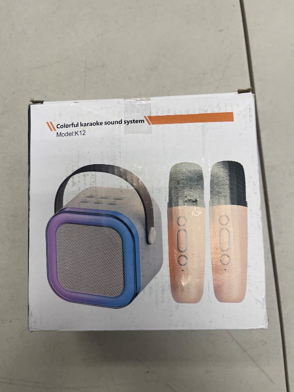 Photo 1 of Mini Kids Karaoke Machine Toy with 2 Wireless Microphones and Light,Portable Bluetooth Speaker Karaoke Sing Voice Changer Equipment Family Travel Birthday Party Gift Multicolours Available (Pink)