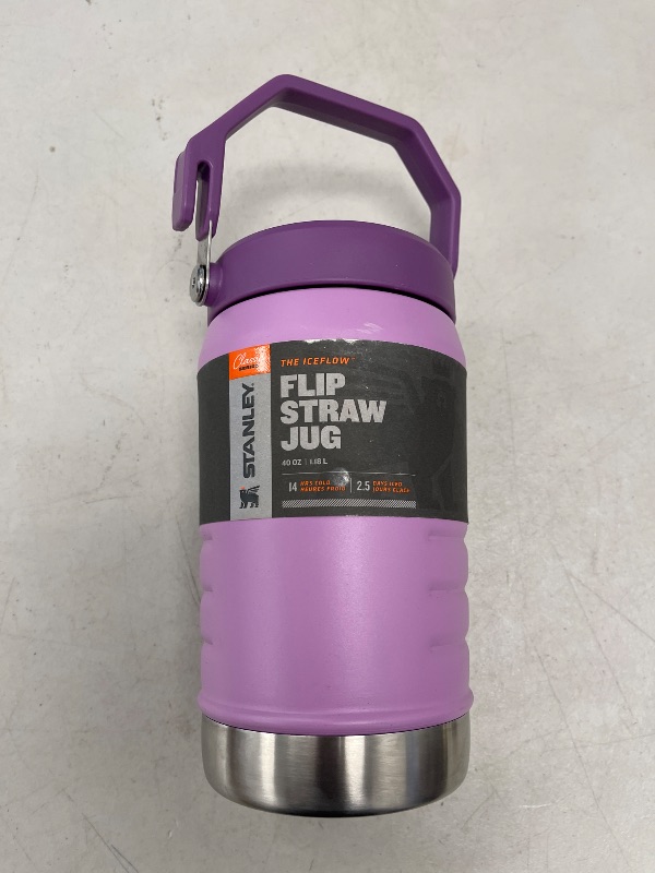 Photo 1 of Stanley IceFlow Flip Straw Jug with Handle 40 oz| Twist On Lid and Flip Up Straw | Leak Resistant for Travel and Sports | Insulated Stainless Steel | BPA-Free | Lilac