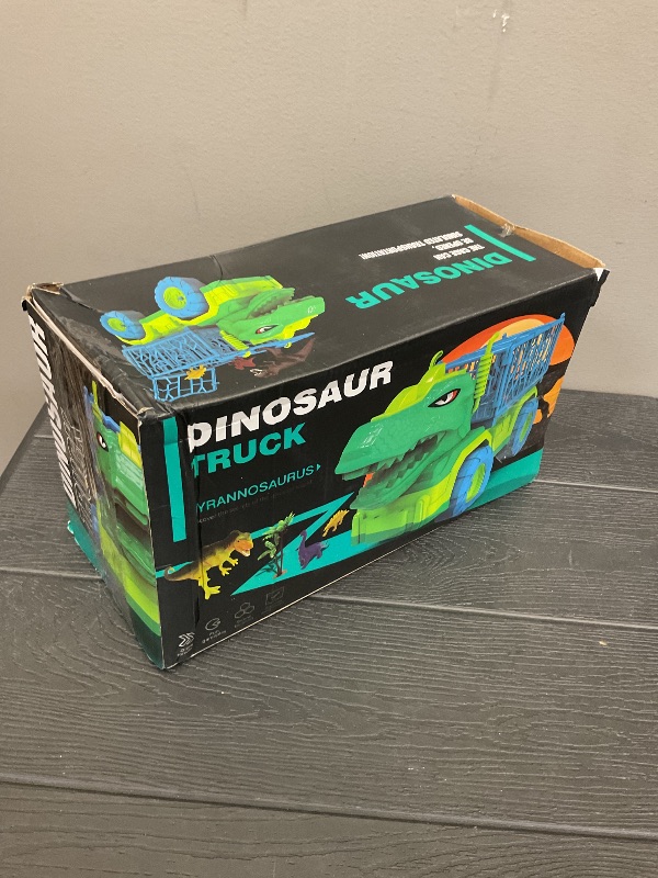 Photo 1 of Dinosaur Truck for Kids 2-4, Dinosaur Action Figure Toys for Toddler 3-5 with 8 Dinosaur Figures, Play Mat, Egg, Tree, T-Rex Transport Car Carrier Birthday Gifts Toys for Boys 2 3 4 5 6 Year Old