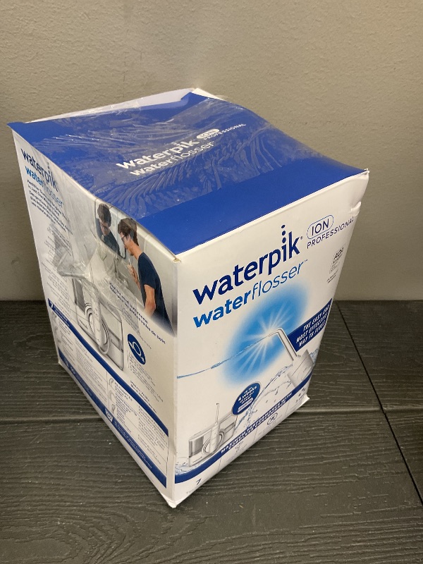 Photo 1 of Waterpik ION Professional Water Flosser, Rechargeable and Portable for Teeth, Gums, Braces, 10 Settings, 7 Flossing Tips For Multiple Users And Needs, ADA Accepted, WF-12 White, 