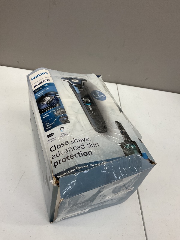Photo 1 of Philips Norelco Shaver 7800, Rechargeable Wet & Dry Electric Shaver with SenseIQ Technology, Quick Clean Pod, Charging Stand, Travel Case and Pop-up Trimmer, S7885/85