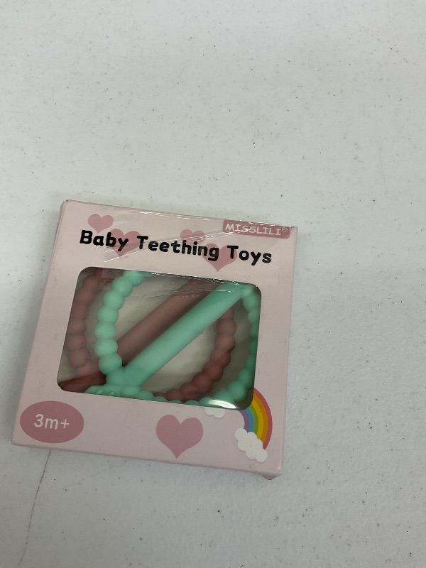 Photo 1 of Baby Teething Toys with Easy-Hold Handle, Silicone Infant Toothbrush, Textured On Both Sides Helps Massage, Soothe Sore Gums, Teething Toys for Babies 0-6 Months, 6-12 Months Bright Green & Caramel