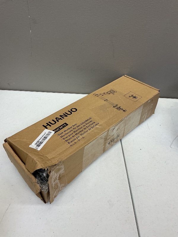Photo 1 of HUANUO Single Monitor Mount, Monitor Arm for 13”-32” Monitors up to 17.6 lbs, Adjustable Stand with 16” Max Height, Desk Mount with C-Clamp and Grommet Base, VESA 75x75mm or 100x100mm