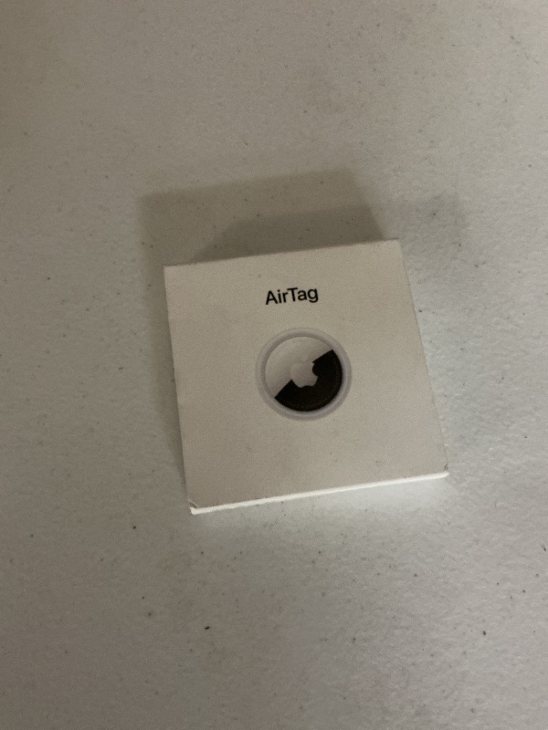 Photo 1 of Apple AirTag. Keep Track of and find Your Keys, Wallet, Luggage, Backpack, and More. Simple one-tap Set up with iPhone or iPad