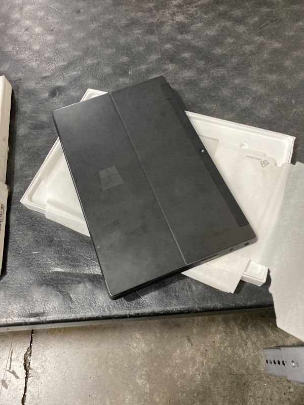 Photo 1 of Microsoft Surface RT 64GB Tablet (Dark Titanium) with Black Touch Cover