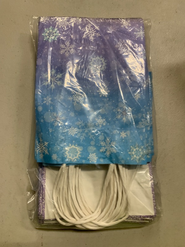Photo 1 of 24 Pcs Winter Snowflake Gift Bags, Blue and Purple Snowflake Goodie Bags Bulk with 24 Tissue Paper, Holiday Kraft Paper Party Favor Bags with Handles for Birthday Christmas Winter Wonderland