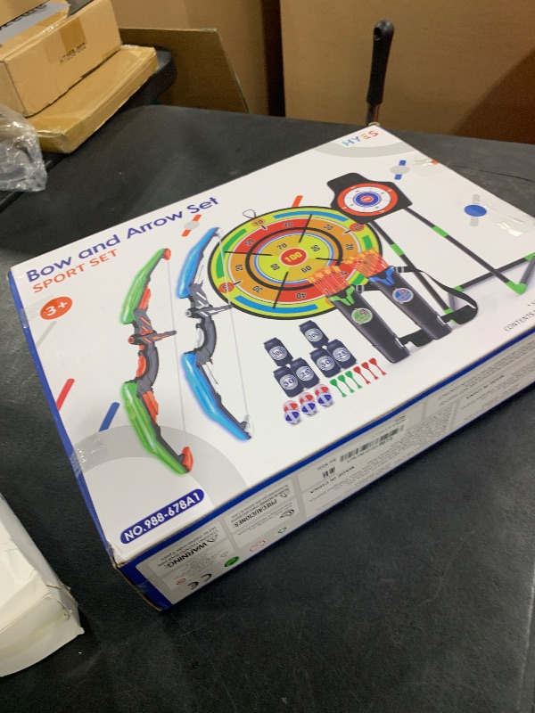Photo 1 of Bow and Arrow for Kids, LED Light Up Archery Set with 24 Suction Cup Arrows, 1 Standing Target, 6 Score Targets & 2 Quiver, Indoor Outdoor Sport Gifts for Boys Girls Ages 4-8