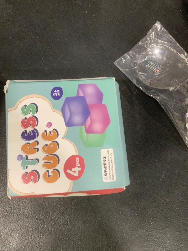 Photo 1 of Fidget Toy Stress Cube 4 Pack, Cube Squishies Anxiety Stress Relief with Thick Substance,Fidgets for Classroom,Stress Balls for Adults Kids Children Teens