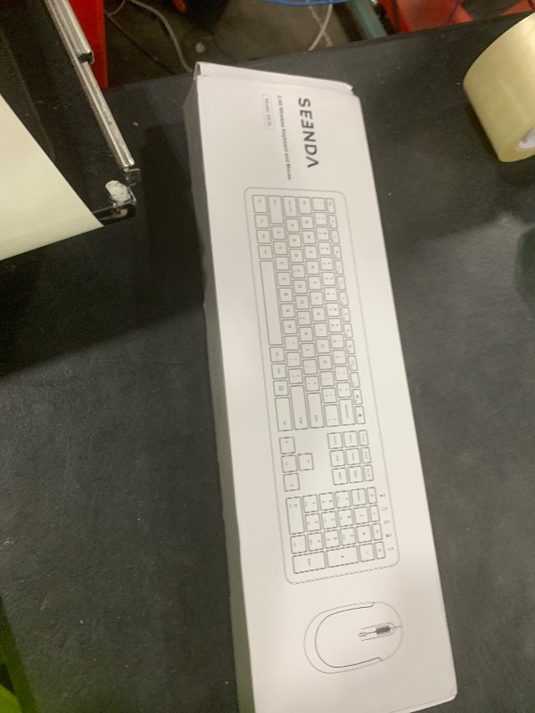Photo 1 of Wireless Keyboard and Mouse Combo - Full Size Slim Thin Wireless Keyboard Mouse with Numeric Keypad 2.4G Stable Connection Adjustable DPI (White & Silver)