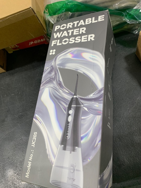 Photo 1 of Water Flosser for Teeth Cleaning and Flossing, 5 Modes Rechargeable Cordless Oral Irrigator 320ml Water Tank Teeth Cleaner, IPX7 Waterproof Portable Electric Dentel Flossers for Home and Travel,Black