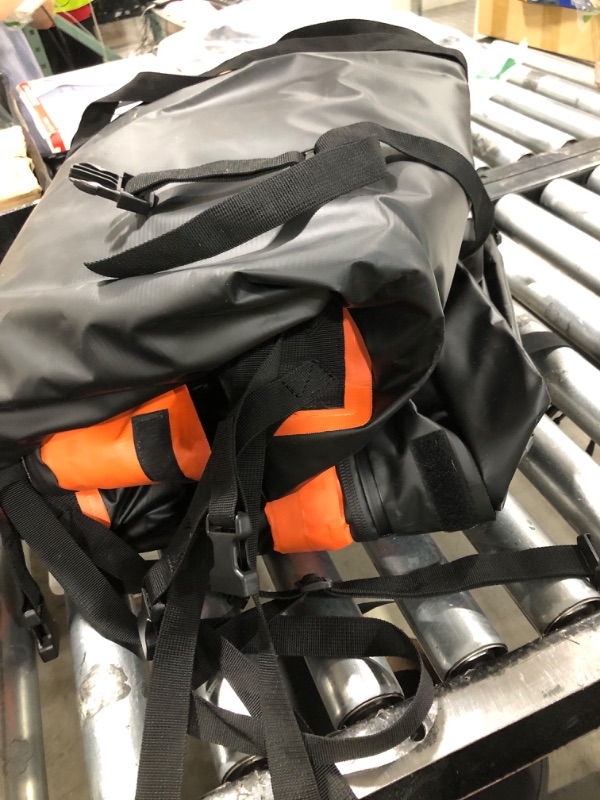 Photo 1 of BIG PLASTIC BLACK AND ORANGE BAG