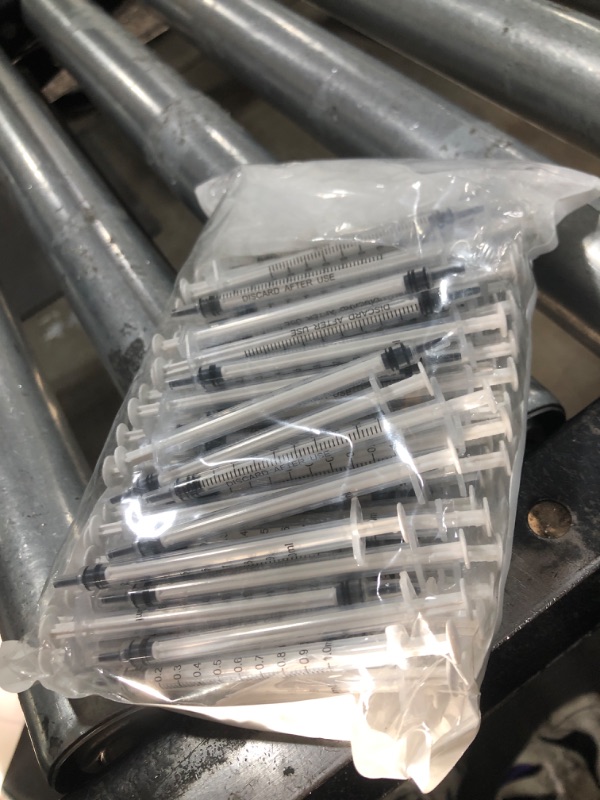 Photo 1 of 100 Pack 1ml Syringe with Cap for Liquid, 1cc Plastic Small Syringes with Cover, Non-Sterile, No Needle