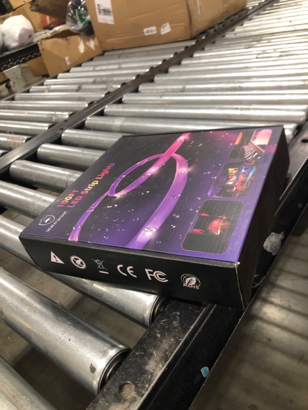 Photo 1 of 100 FT outdoor LED strip lights (2 rolls of 50 FT), IP65 waterproof, music synchronization RGB LED light, with 44 key remote control and application, used for outdoor, balcony, and roof decoration