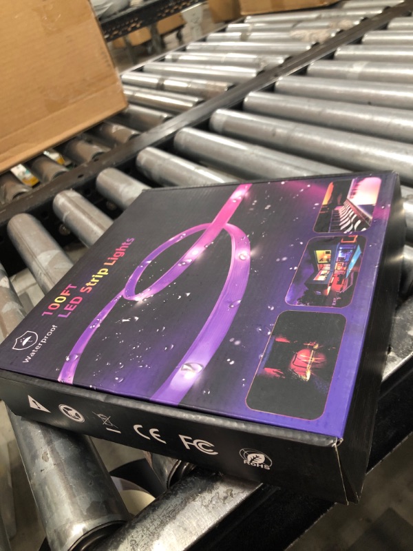 Photo 1 of 100 FT outdoor LED strip lights (2 rolls of 50 FT), IP65 waterproof, music synchronization RGB LED light, with 44 key remote control and application, used for outdoor, balcony, and roof decoration