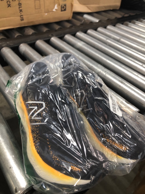 Photo 1 of New Balance Men's Fresh Foam X 1080 V12 Running Shoe, Black/Hot Marigold, 7.5