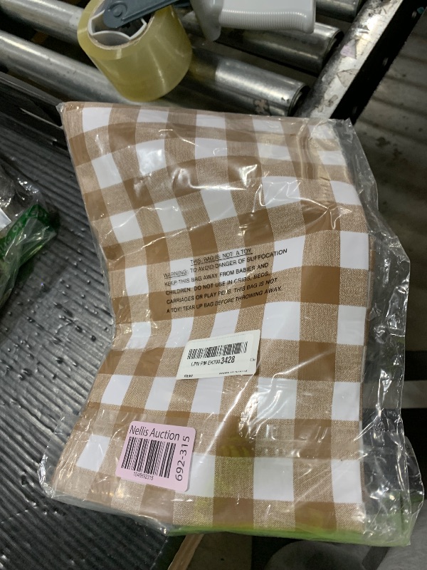 Photo 1 of sancua Checkered Vinyl Rectangle Tablecloth - 52 x 70 Inch - 100% Waterproof Oil Proof Spill Proof PVC Table Cloth, Wipe Clean Table Cover for Dining Tables, Buffet Parties, Khaki and White