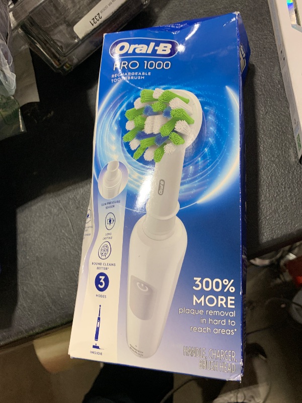 View 2 of Oral-B Pro 1000 Rechargeable Electric Toothbrush, White