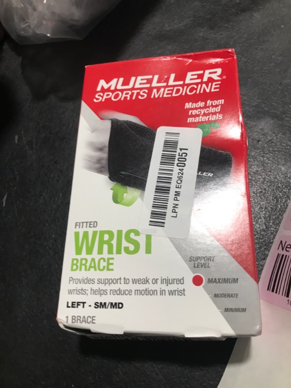 Photo 1 of MUELLER Sports Medicine Green Fitted Wrist Brace for Men and Women, Wrist Pain Relief Support, Ideal for Carpal Tunnel, Tendonitis, Arthritis, Left Hand, Black, Small/Medium