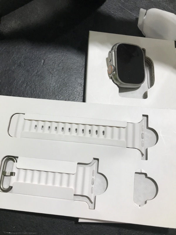 Photo 1 of Apple Watch Ultra [GPS + Cellular 49mm] Titanium Case with White Ocean Band, One Size (Renewed Premium)