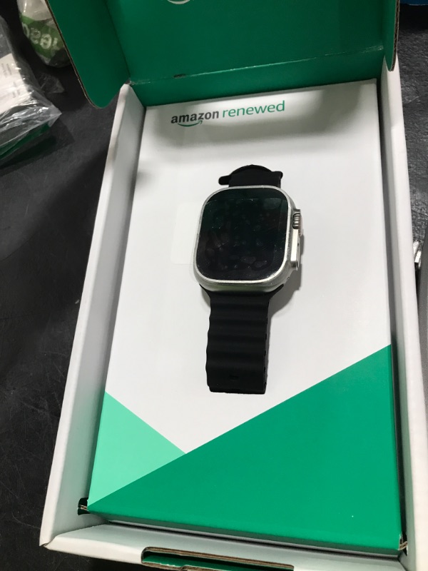 Photo 1 of Apple Watch Ultra [GPS + Cellular 49mm] Titanium Case with Midnight Ocean Band, One Size (Renewed Premium)