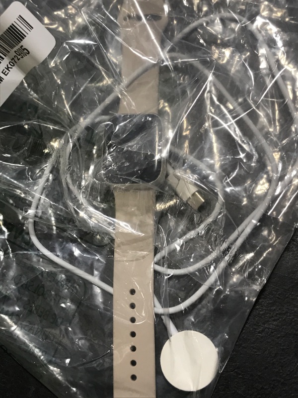 Photo 1 of Apple Watch Series 9 [GPS 41mm] Starlight Aluminum Case with Starlight Sport Band M/L (Renewed Premium)